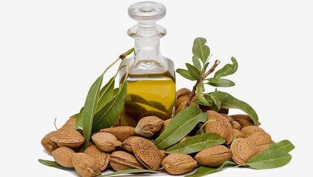 Hair growth treatments - Applying the almond oil on your hair
