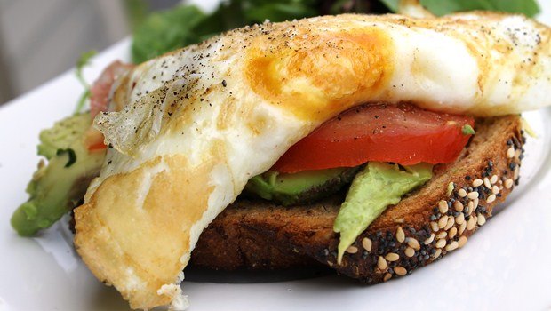 open faced broiled egg, tomato, spinach sandwich