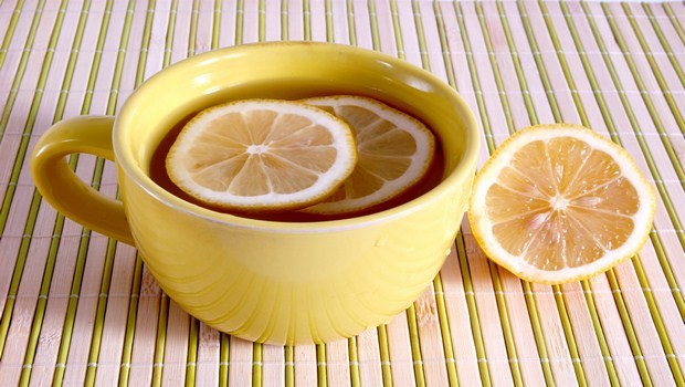 home remedies for bloated stomach-warm lemon water