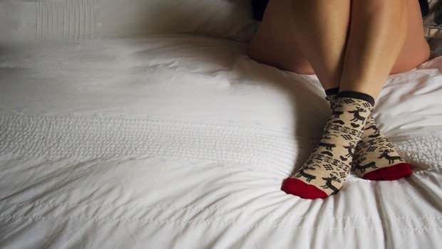 how to treat restless leg syndrome-wear socks to bed