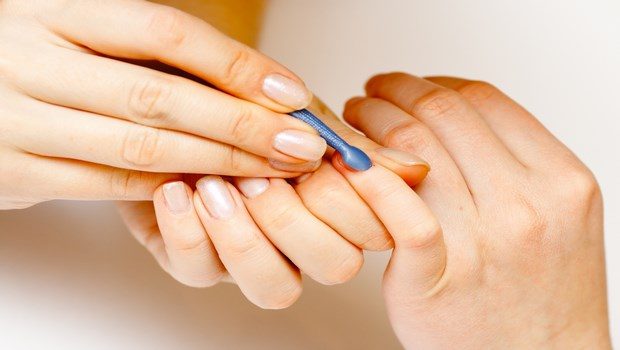 how to make your nails stronger-massage your nails