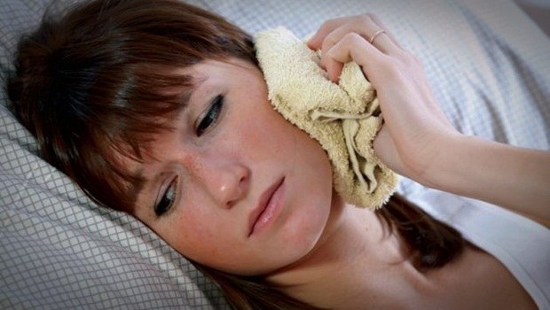 home remedies for clogged ears - warm or hot compress