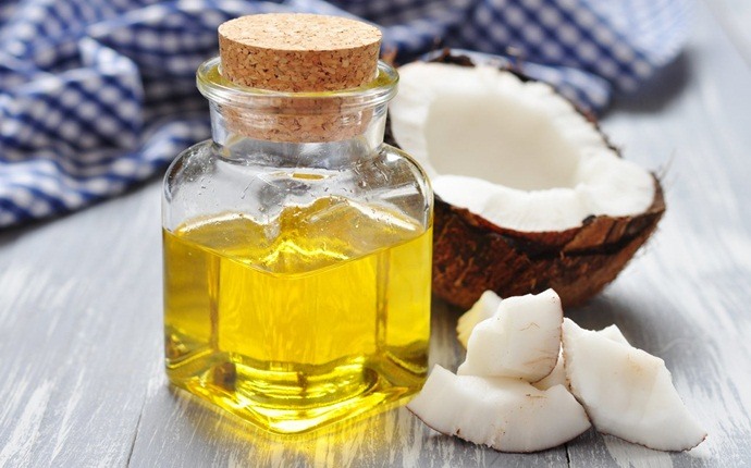 how to get rid of frizzy hair - coconut oil and hot water
