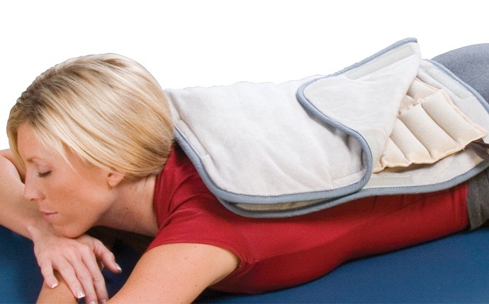 how to cure backache - heat therapy