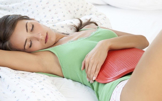 home remedies for sour stomach - heating pad