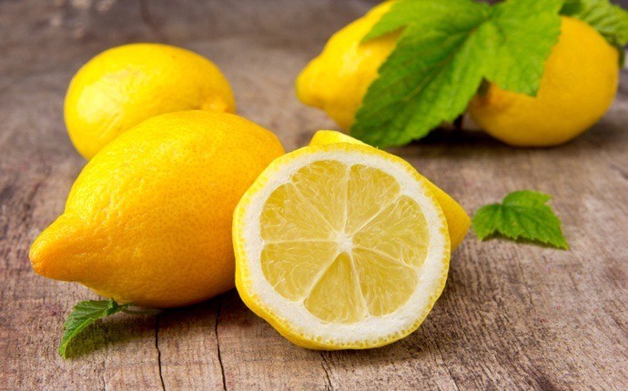 how to whiten yellow teeth - lemon, water, and salt