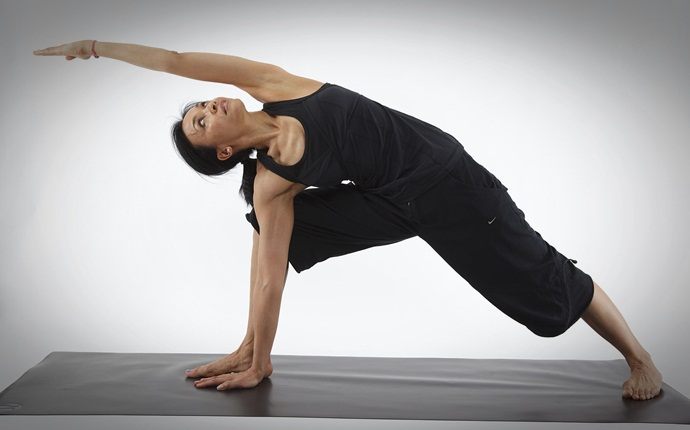 yoga poses for back pain - utthita trikonasana or triangle pose