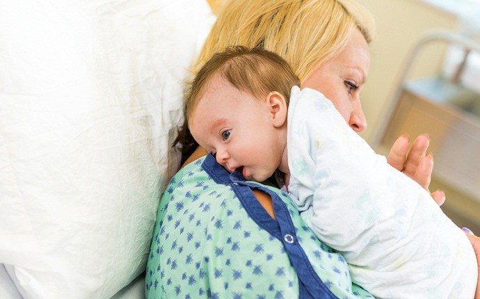 how to treat colic - burp your baby