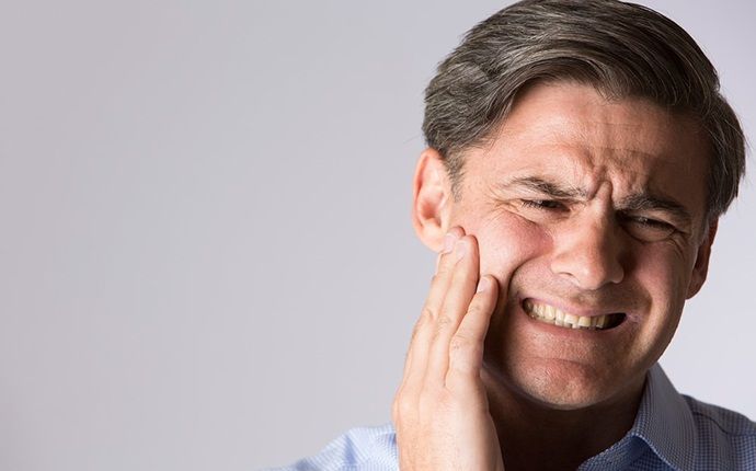 symptoms of tmj - clicking of the jaw