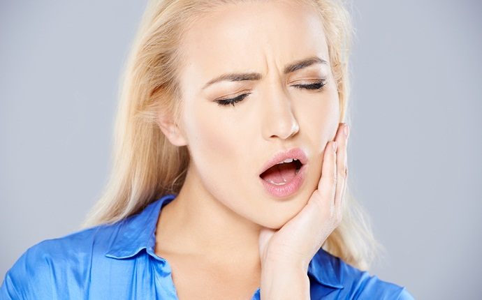 symptoms of tmj - muscle pain around the jaw