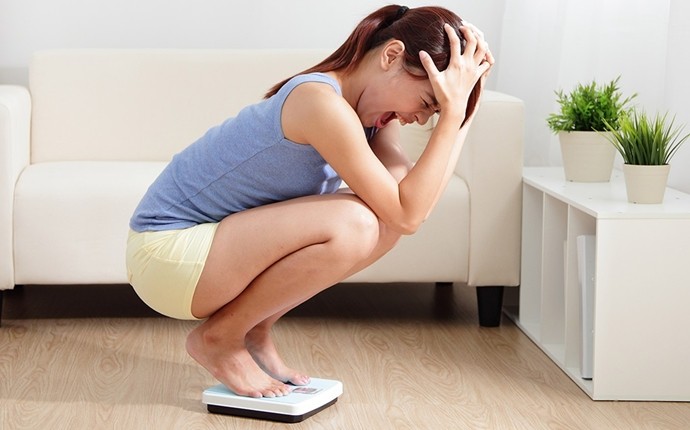 symptoms of polycystic ovary syndrome - weight gain, obesity, and not have the ability to lose weight